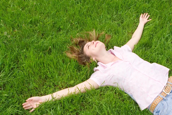 stock image Sweet woman rest on the grass