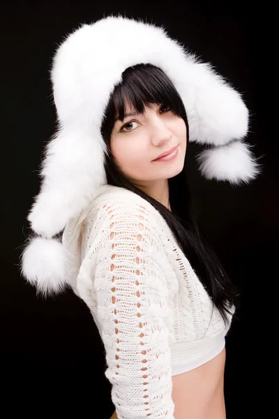 Portrait of the woman with winter hat on black background — Stock Photo, Image