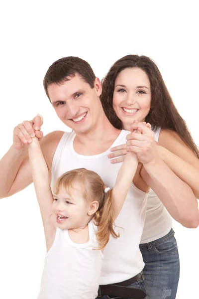 Glad mamma, pappa och dotter som spelar på den vita bak — Stockfoto