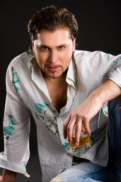 Fashion man with drink — Stock Photo, Image