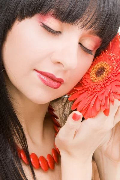 Молода жінка з квіткою — стокове фото