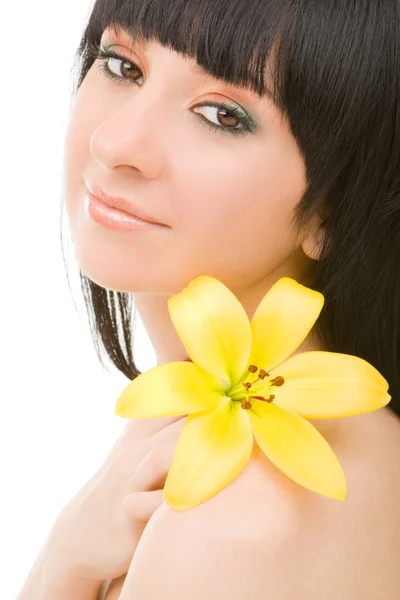 Mujer joven con flor de lirio —  Fotos de Stock