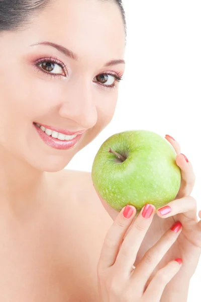 Słodka dziewczyna jedzenie zielone jabłko na białym tle — Zdjęcie stockowe