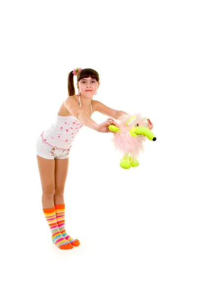 Glad tjej med leksak — Stockfoto