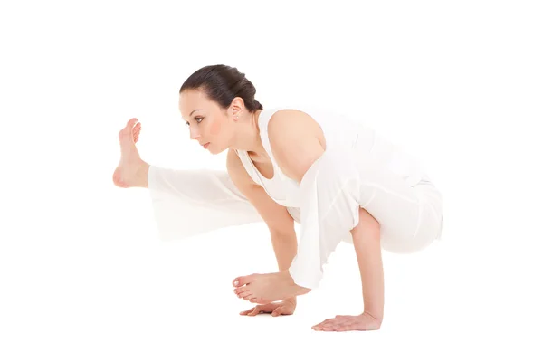 Ung kvinde gør yoga motion - Stock-foto