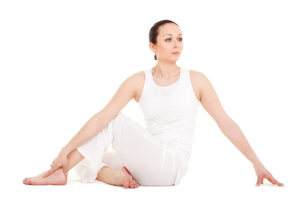stock image Young woman doing yoga exercise