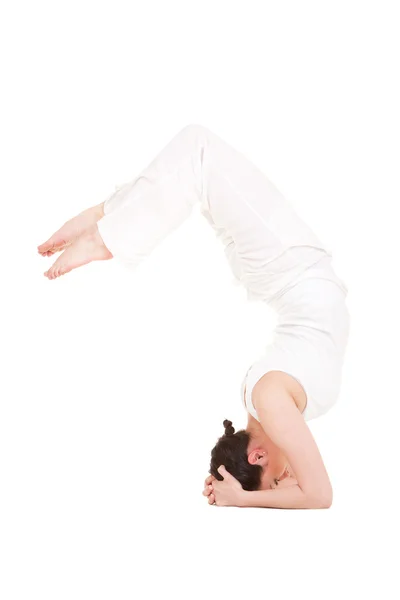 stock image Young woman doing yoga exercise