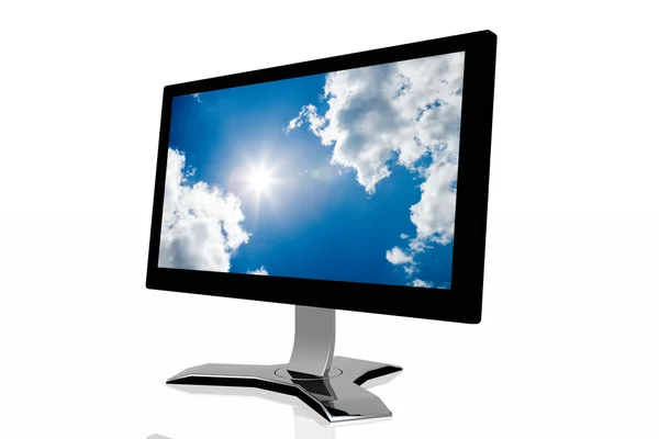 stock image 3d monitor with sky background