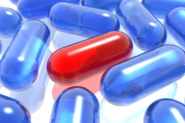 Ainutlaatuinen punainen pillereitä — kuvapankkivalokuva
