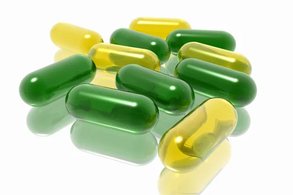 Gröna och gula tabletter — Stockfoto