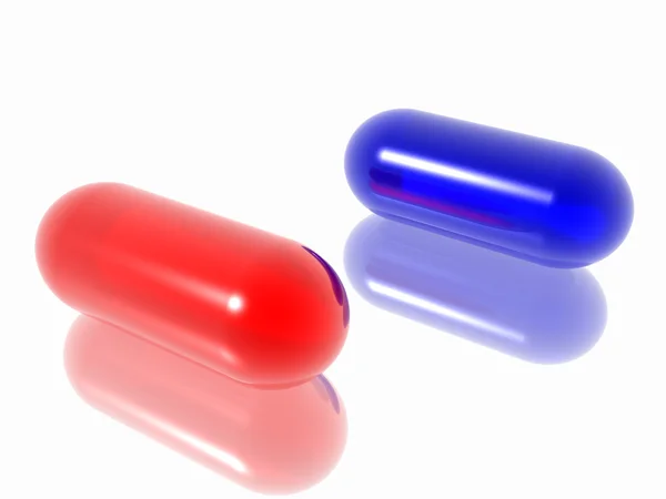 Rood en blauw pillen — Stockfoto