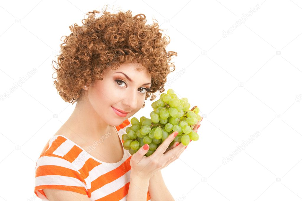 Pretty woman with grape on the white background