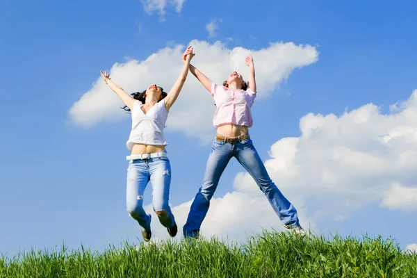 Happy young women is jumping — Stock Photo, Image