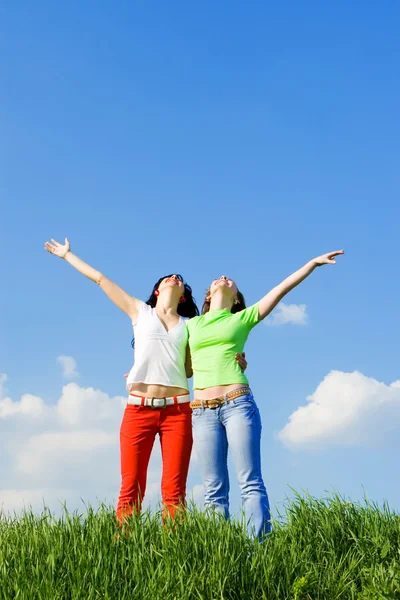 stock image Two happy young women dreams to fly