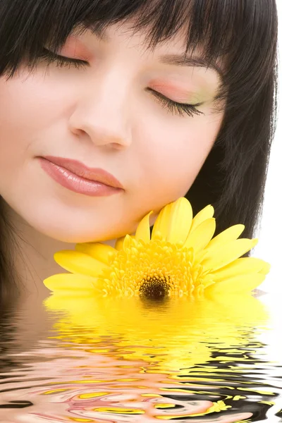 Young woman with gerber flower — Stock Photo, Image
