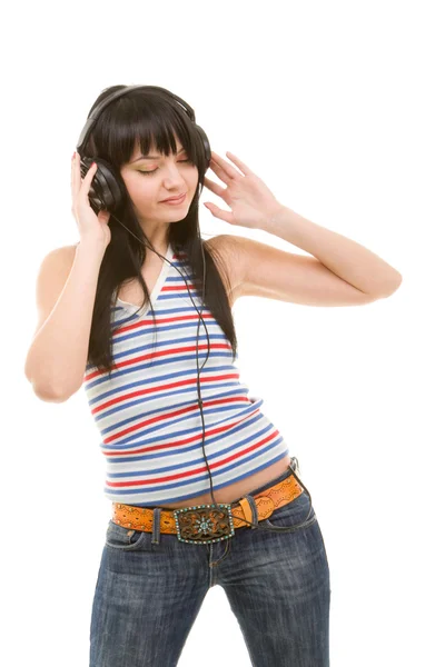 Jonge vrouw met koptelefoon — Stockfoto