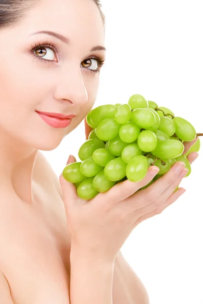 Hübsche Frau mit grünen Trauben — Stockfoto