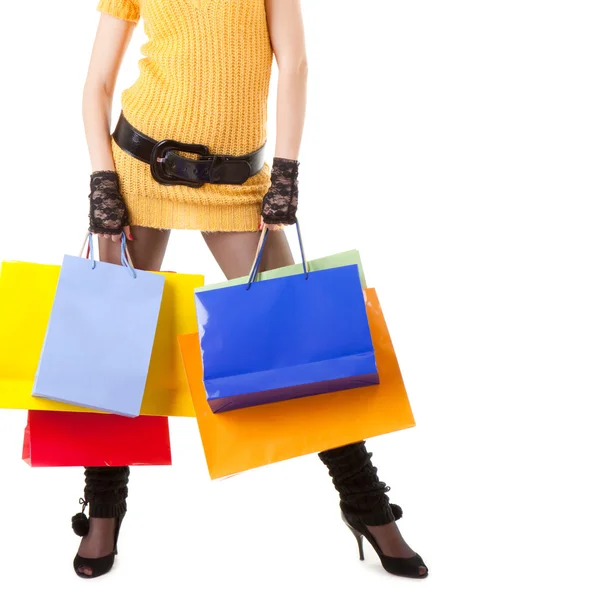 Mulher de moda com pacotes de cores — Fotografia de Stock