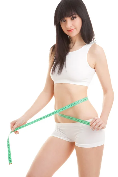 Mujer atlética con cinta métrica — Foto de Stock