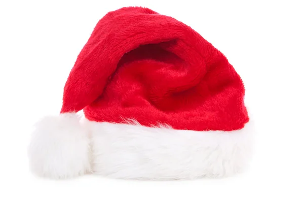Santa kapelusz na białym tle w tle — Zdjęcie stockowe