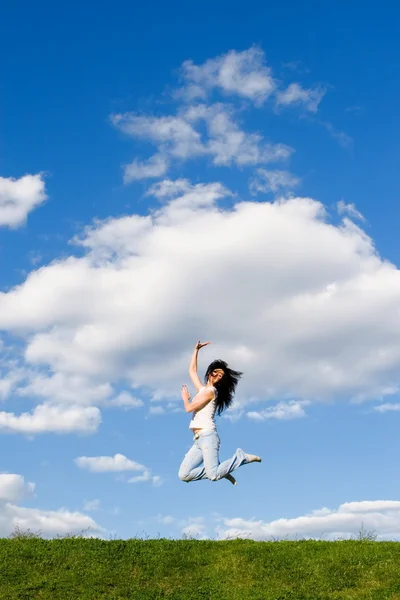 Pretty young woman is jumping — Stock Photo, Image