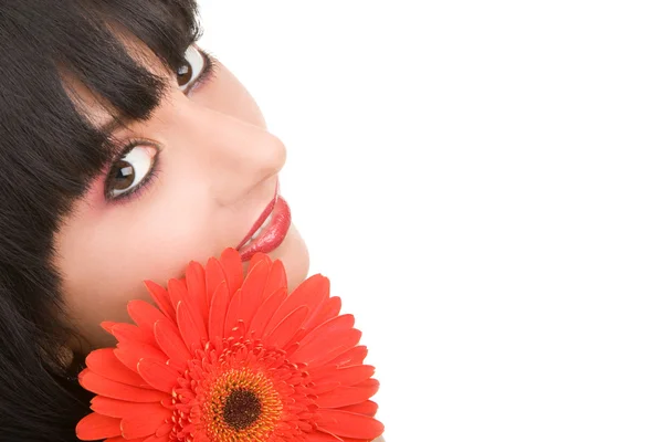 Young woman with gerber flower — Stock Photo, Image
