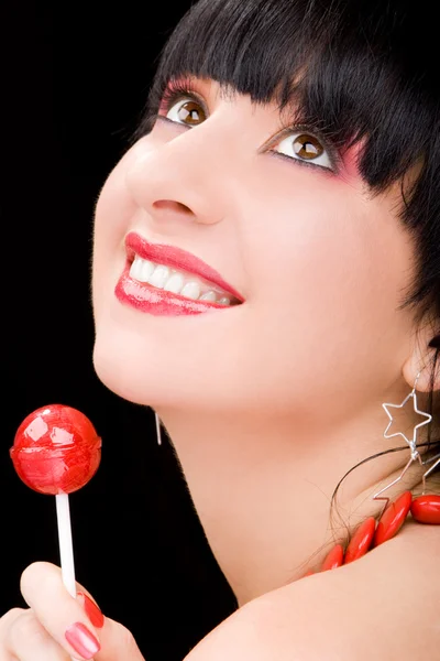 Sweet woman with candy — Stock Photo, Image