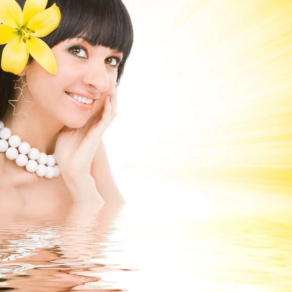 stock image Young woman with lily flower