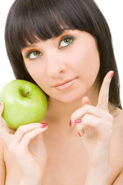 Bonita mujer con manzana verde aislada sobre fondo blanco — Foto de Stock