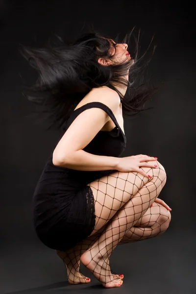 Sexy ženy tančí na tmavém pozadí — Stock fotografie