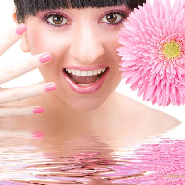 Mujer divertida con flor de gerber —  Fotos de Stock