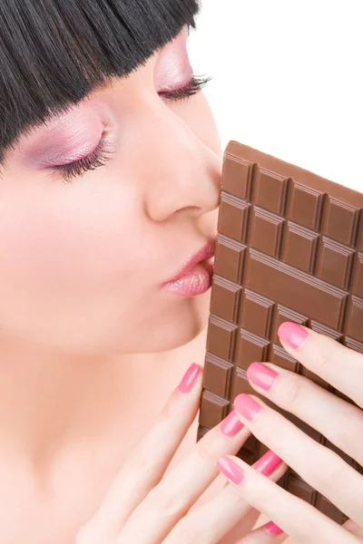 Mulher divertida comer chocolate — Fotografia de Stock