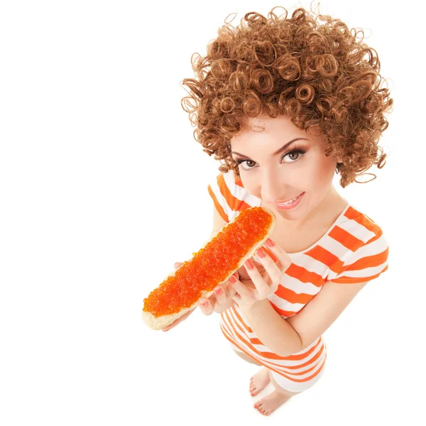 Fun woman eating the sandwich with roe on the white background — Stock Photo, Image