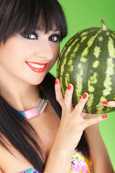 Fashion woman with watermelon on the green background — Stock Photo, Image