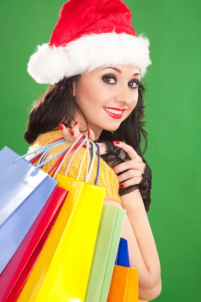 Fun santa femme avec des paquets de couleur — Photo