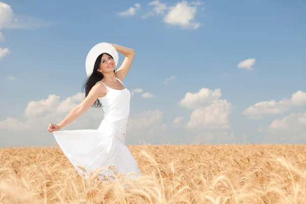 Happy woman in golden wheat — Stock Photo, Image