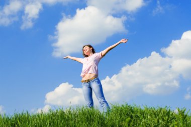 Happy young woman dreams to fly on winds clipart