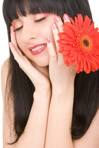 赤い花を持つ若い女 — ストック写真