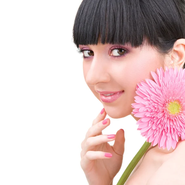 Young woman with gerber flower — Stock Photo, Image