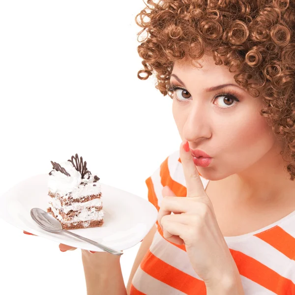 Beyaz zemin üzerine pasta yiyen kadın eğlence — Stok fotoğraf