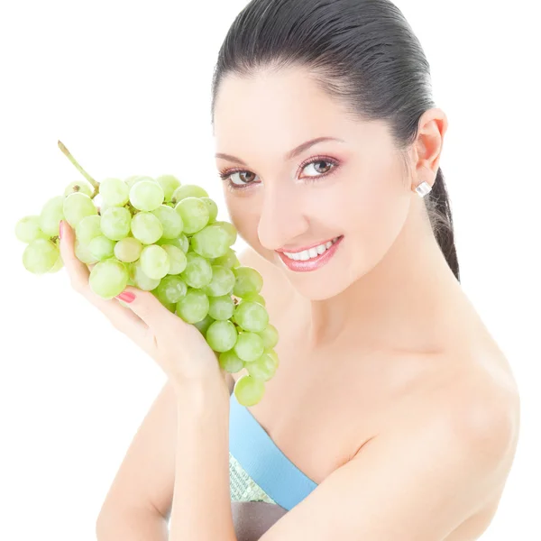 Ładna kobieta z winogron na białym tle — Zdjęcie stockowe