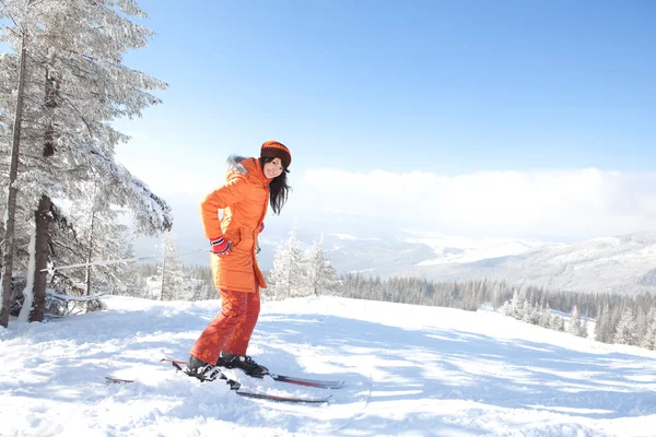 Happy girl with ski in the winter landscape — Stock Photo, Image