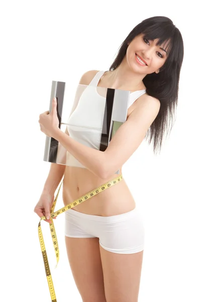 Pretty woman with glass scale and measure tape — Stock Photo, Image
