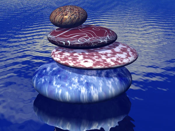 Куча сбалансированных камней на море — стоковое фото
