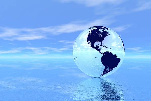 Глобус в океане — стоковое фото