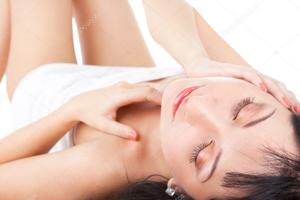 Cute woman relaxing in spa