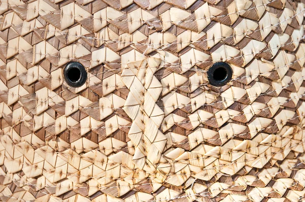 Die Augen der geflochtenen Bambusmütze — Stockfoto