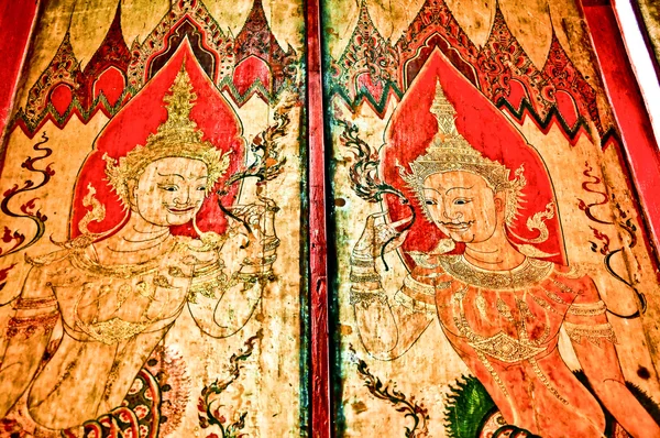 Die thailändische Kunst auf der hölzernen Tür des Tempels — Stockfoto