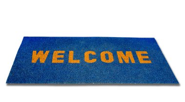 The Doormat of welcome text on wood background clipart