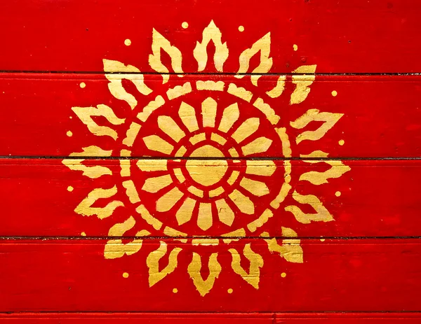 La pintura símbolo de oro de la religión en madera en el templo — Foto de Stock